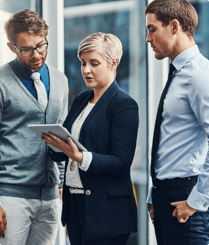 Team collaborating on a tablet